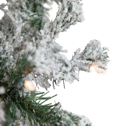 Northlight Pre-Lit Traditional Trees>6' Pre-Lit Slim Flocked Pine Artificial Christmas Tree, Clear Lights